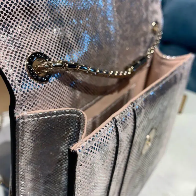 Serpent-Head-Clasp-Forever-Crossbody-Bag-in-Karung-Skin-288782-11.webp
