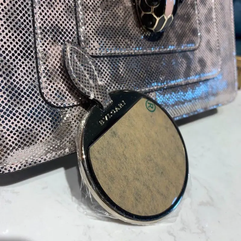 Serpent-Head-Clasp-Forever-Crossbody-Bag-in-Karung-Skin-288782-4.webp