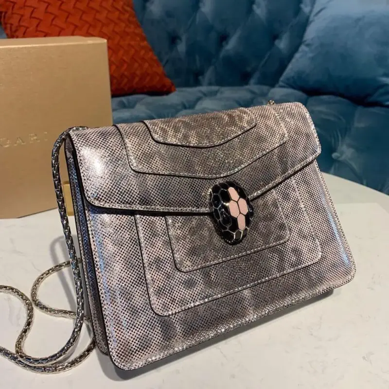 Serpent-Head-Clasp-Forever-Crossbody-Bag-in-Karung-Skin-288782-5.webp