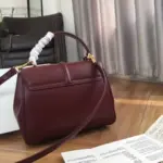 Small-16-Top-Handle-Bag-in-Satinated-Calfskin-188003-Burgundy-Small-16-Top-Handle-Bag-in-Satinated-Calfskin-188003-Burgundy-4.webp