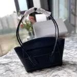 Small-Arco-Top-Handle-Tote-in-Grainy-Woven-Calfskin-580725-Black-Small-Arco-Top-Handle-Tote-in-Grainy-Woven-Calfskin-580725-Black-1.webp