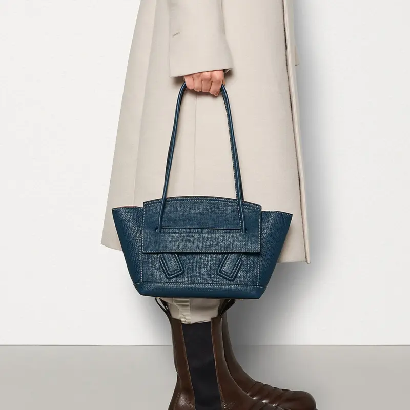 Small-Arco-Top-Handle-Tote-in-Grainy-Woven-Calfskin-580725-Navy-Blue-Small-Arco-Top-Handle-Tote-in-Grainy-Woven-Calfskin-580725-Navy-Blue-2.webp