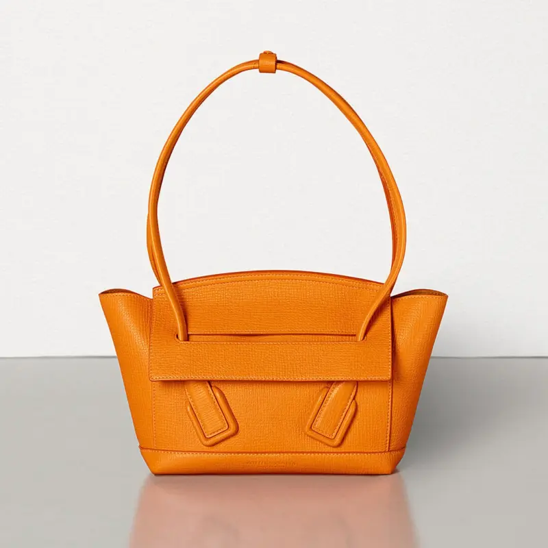 Small-Arco-Top-Handle-Tote-in-Grainy-Woven-Calfskin-580725-Orange-Small-Arco-Top-Handle-Tote-in-Grainy-Woven-Calfskin-580725-Orange-1.webp