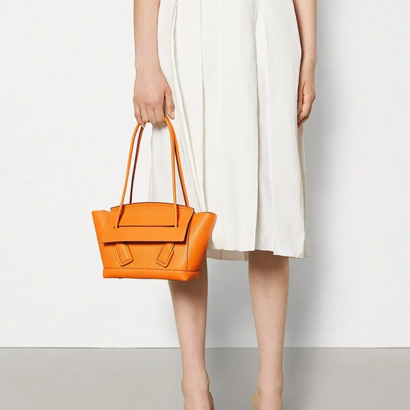 Small-Arco-Top-Handle-Tote-in-Grainy-Woven-Calfskin-580725-Orange-Small-Arco-Top-Handle-Tote-in-Grainy-Woven-Calfskin-580725-Orange-2.webp