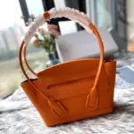 Small-Arco-Top-Handle-Tote-in-Grainy-Woven-Calfskin-580725-Orange-Small-Arco-Top-Handle-Tote-in-Grainy-Woven-Calfskin-580725-Orange-3.webp