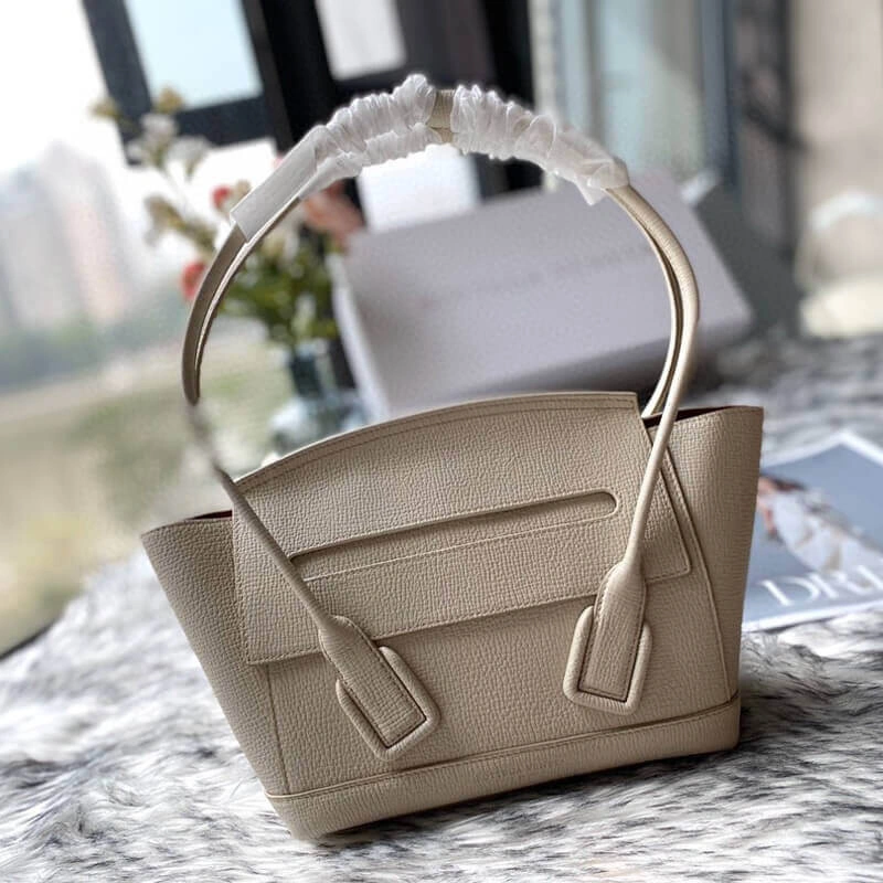 Small-Arco-Top-Handle-Tote-in-Grainy-Woven-Calfskin-580725-White-Small-Arco-Top-Handle-Tote-in-Grainy-Woven-Calfskin-580725-White-1.webp
