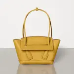 Small-Arco-Top-Handle-Tote-in-Grainy-Woven-Calfskin-580725-Yellow-Small-Arco-Top-Handle-Tote-in-Grainy-Woven-Calfskin-580725-Yellow-1.webp