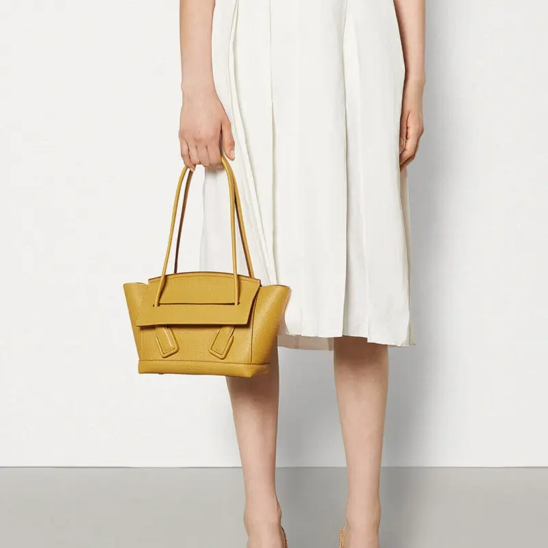 Small-Arco-Top-Handle-Tote-in-Grainy-Woven-Calfskin-580725-Yellow-Small-Arco-Top-Handle-Tote-in-Grainy-Woven-Calfskin-580725-Yellow-2.webp