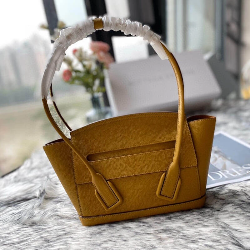 Small-Arco-Top-Handle-Tote-in-Grainy-Woven-Calfskin-580725-Yellow-Small-Arco-Top-Handle-Tote-in-Grainy-Woven-Calfskin-580725-Yellow-3.webp