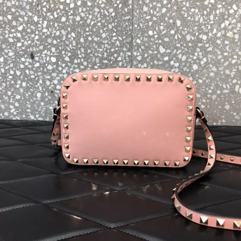 Small-Rockstud-Accent-Calfskin-Leather-Crossbody-Bag-0809-Pink-Small-Rockstud-Accent-Calfskin-Leather-Crossbody-Bag-0809-Pink-1.webp