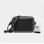 Small-Rockstud-Accent-Calfskin-Leather-Crossbody-Bag-0809-Small-Rockstud-Accent-Calfskin-Leather-Crossbody-Bag-0809.webp