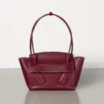 Small-Top-Handle-Tote-Bag-in-Smooth-Calfskin-580725-Bordeaux-Small-Top-Handle-Tote-Bag-in-Smooth-Calfskin-580725-Bordeaux-1.webp