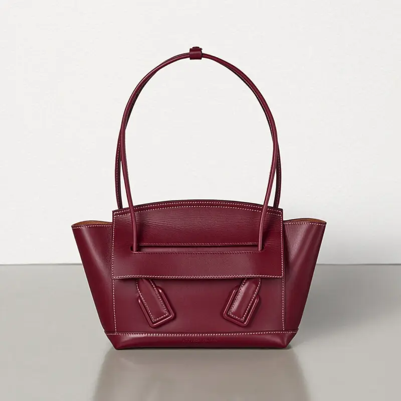 Small-Top-Handle-Tote-Bag-in-Smooth-Calfskin-580725-Bordeaux-Small-Top-Handle-Tote-Bag-in-Smooth-Calfskin-580725-Bordeaux-1.webp