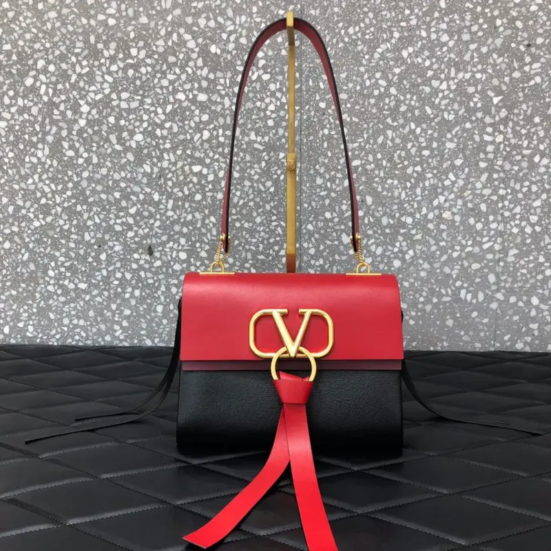 Small-Vring-Shoulder-Bag-in-Calfskin-and-Buffalo-Leather-0003-Red-Small-Vring-Shoulder-Bag-in-Calfskin-and-Buffalo-Leather-0003-Red-1.webp