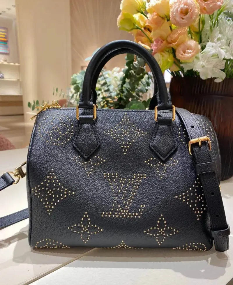Speedy-Bandouliere-25-Boston-Bag-in-Black-Studded-Monogram-M46736-2.webp