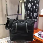 Studded-Black-Nylon-Tote-Bag-with-Leather-Details-1BG212-Black-Studded-Black-Nylon-Tote-Bag-with-Leather-Details-1BG212-Black-1.webp
