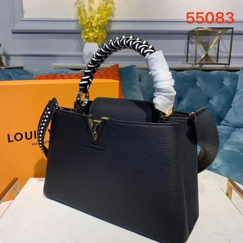 Taurillon-Leather-Capucines-PM-Top-Handle-Handbag-M55083-Black-Taurillon-Leather-Capucines-PM-Top-Handle-Handbag-M55083-Black-3.webp