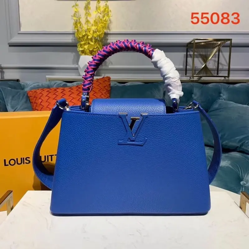 Taurillon-Leather-Capucines-PM-Top-Handle-Handbag-M55083-Blue-Taurillon-Leather-Capucines-PM-Top-Handle-Handbag-M55083-Blue-1.webp