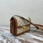 Teen-Emblem-Crossbody-Bag-in-Monogram-Canvas-and-Calfskin-188882-3.webp
