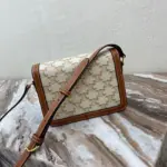 Teen-Emblem-Crossbody-Bag-in-Monogram-Canvas-and-Calfskin-188882-5.webp