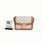 Teen-Shoulder-Bag-in-Classic-Triomphe-Canvas-and-Calfskin-188423-1.webp