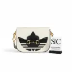 Vintage-Style-Horsebit-1955-Mini-Top-Handle-Bag-658574-Vintage-Style-Horsebit-1955-Mini-Top-Handle-Bag-658574.webp