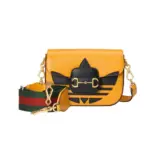 Vintage-Style-Horsebit-1955-Mini-Top-Handle-Bag-658574-Yellow-Vintage-Style-Horsebit-1955-Mini-Top-Handle-Bag-658574-Yellow-1.webp
