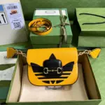 Vintage-Style-Horsebit-1955-Mini-Top-Handle-Bag-658574-Yellow-Vintage-Style-Horsebit-1955-Mini-Top-Handle-Bag-658574-Yellow-2.webp