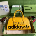 Vintage-Style-Web-Stripe-Mini-Duffle-Travel-Bag-702397-Yellow-Vintage-Style-Web-Stripe-Mini-Duffle-Travel-Bag-702397-Yellow-5.webp