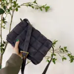 Woven-Padded-Cassette-Crossbody-Shoulder-Bag-in-Suede-591970-Black-Woven-Padded-Cassette-Crossbody-Shoulder-Bag-in-Suede-591970-Black-1.webp